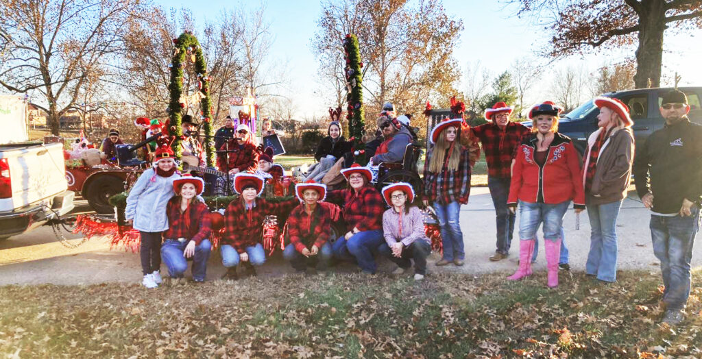 Christmas parade float with group of people